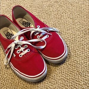 red and white laced Vans